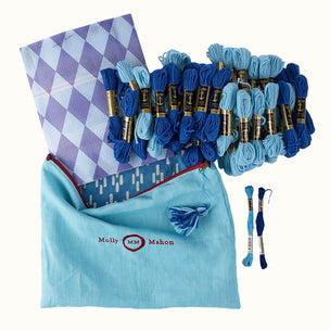 Embroidery thread set with a blue bag featuring 'Molly Mahon' branding on a white background.