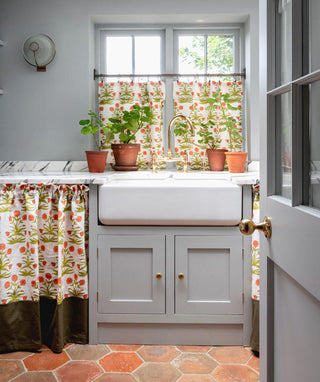 Molly Mahon block print curtains in modern english farm kitchen