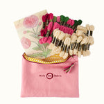 Embroidery kit - floral-pattern in a pink bag with 'Molly Mahon' branding.